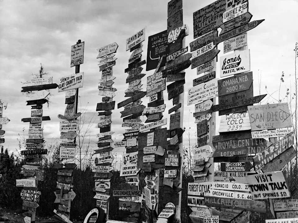 USA Road signs at the Alaska Highway; January 01, 1958