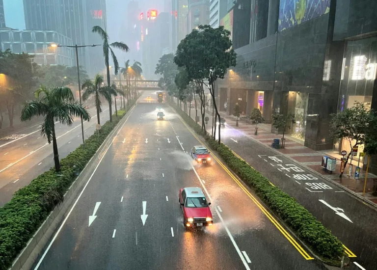 Hong Kong hit by flooding after flurry of rainstorm warnings