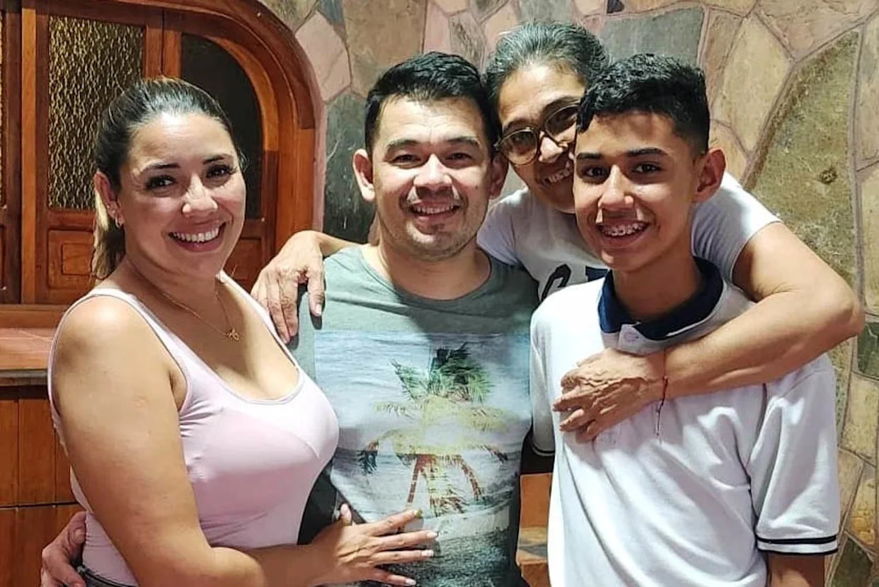 Andry Blanco Bonilla, center, is reunited with his family in Venezuela on upon reuniting with his family on Tuesday, July 22, 2025, after spending four months in CECOT prison in El Salvador. (Courtesy Blanco Bonilla family)