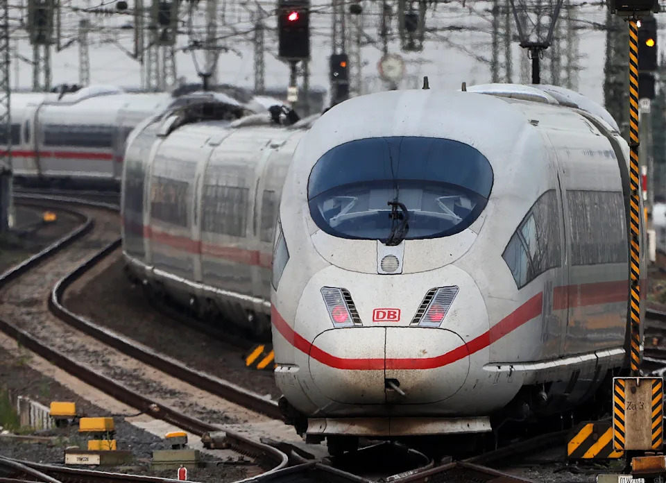 FILE - In this Wednesday, June 19, 2019 file photo, an ICE train approaches the main train station in Frankfurt, Germany. Germany's upper house of parliament has approved a plan to lower the value-added tax on train tickets, making rail travel cheaper from Jan. 1, 2020. (AP Photo/Michael Probst, file)