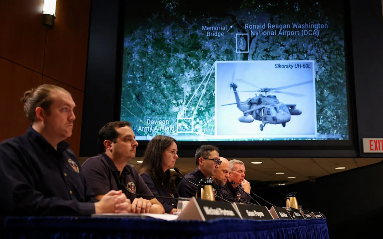 National Transportation Safety Board members attend an investigative hearing on the Washington DC plane crash