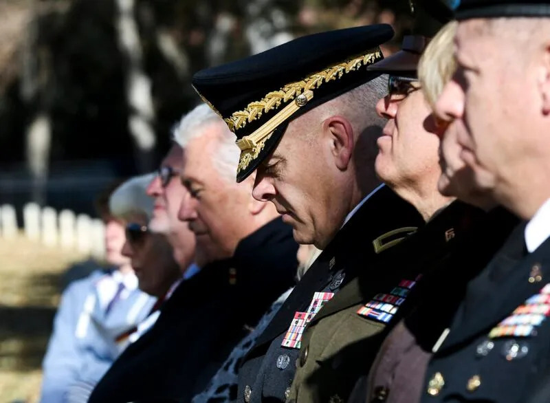 Brig. Gen. Michael Curley listens to speeches during the Volkstrauertag ceremony at the Fort Douglas Military Cemetery in Salt Lake City on Sunday, Nov. 17, 2019.