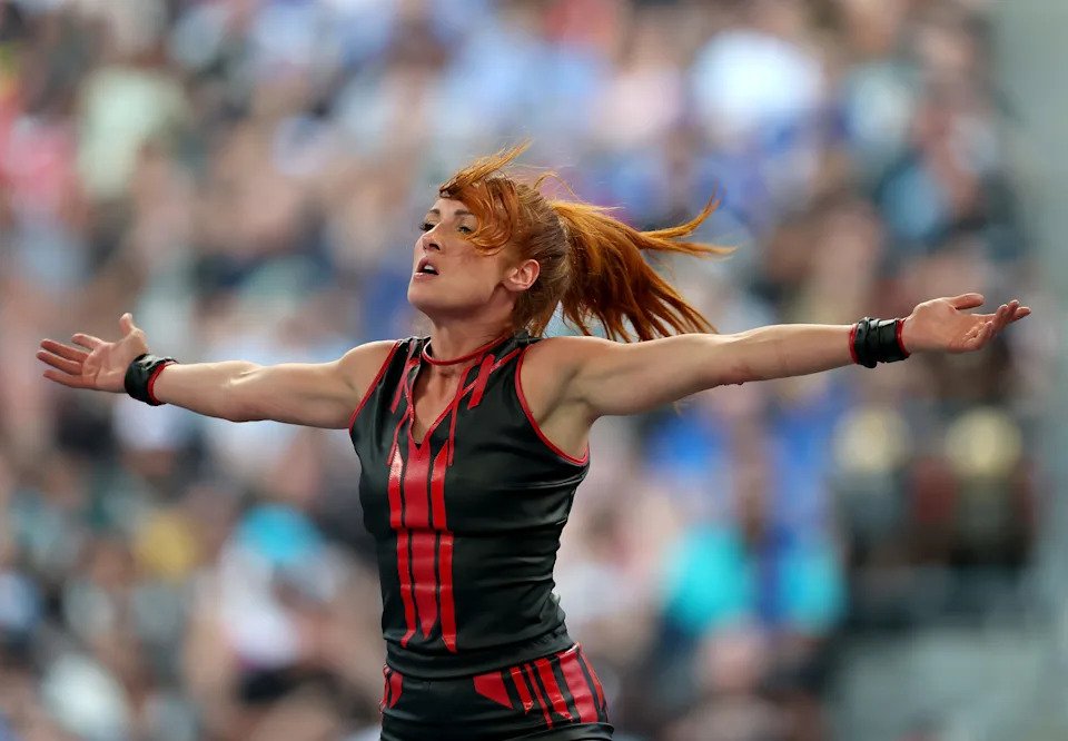Becky Lynch makes her entrance before taking on Lyra Valkyria in the WWE Women's Intercontinental Championship during the WWE 2025 SummerSlam at MetLife Stadium on Aug. 3, 2025 in East Rutherford, New Jersey.