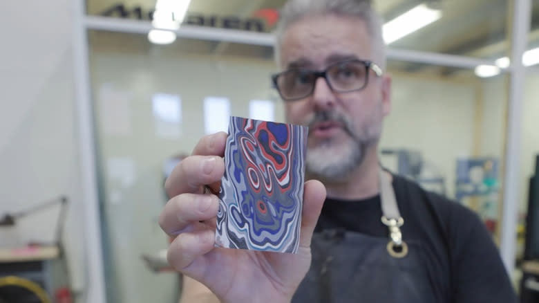 James Thompson, co-owner of Arcanaut watches displays a piece of Fordite.