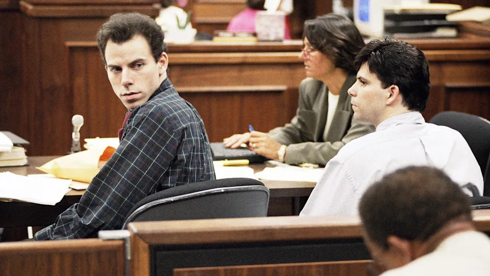 Erik, left, and Lyle Menendez sit next to each other in court during their second trial. / Credit: Associated Press