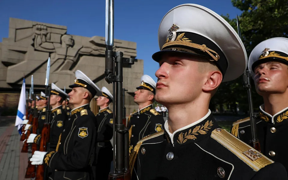 Russian sailors and guards of honour lined up in the Black Sea port of Sevastopol to mark the celebrations
