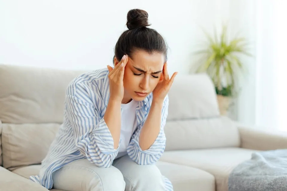 Woman with a tension headache.