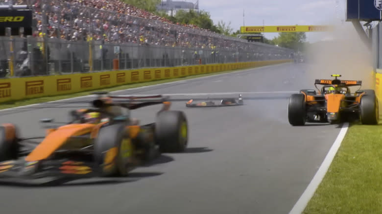 Lando Norris' McLaren losing the front wing after a collision with teammate Oscar Piastri at the Canadian GP 2025.
