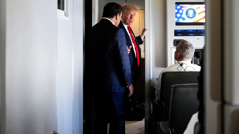 President Donald Trump after speaking with reporters aboard Air Force One while en route to Joint Base Elmendorf-Richardson, Alaska, on Friday, August 15, 2025. - Julia Demaree Nikhinson/AP