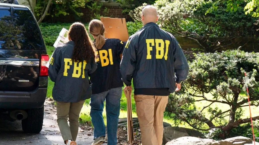 Live updates: Bolton home raided by FBI; Powell signals interest rate cut likely