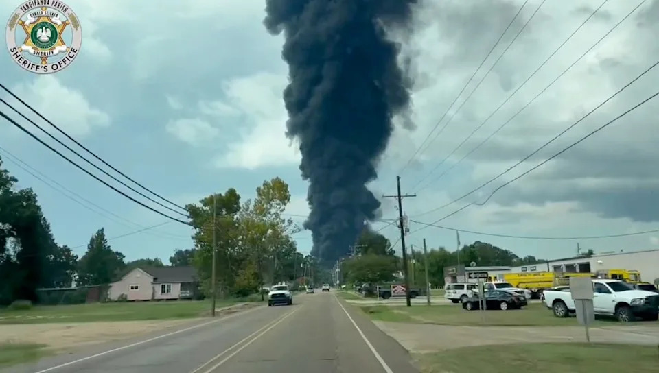 A massive explosion at a Louisiana auto supply plant has caused a huge fire and billows of black smoke to plume into the air as authorities order people to evacuate the area (Tangipahoa Parish Sheriff's Office)