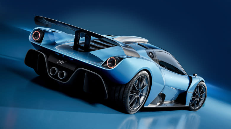rear three-quarters look at the blue GMSV Le Mans GTR in front of a blue background