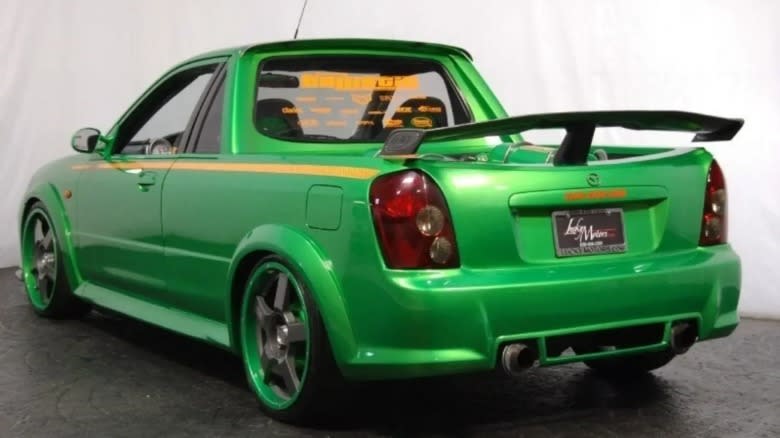2002 Mazda Protege 2005 SEMA Ballistic Unlimited MazdaSpeed TranSport green rear three-quarter