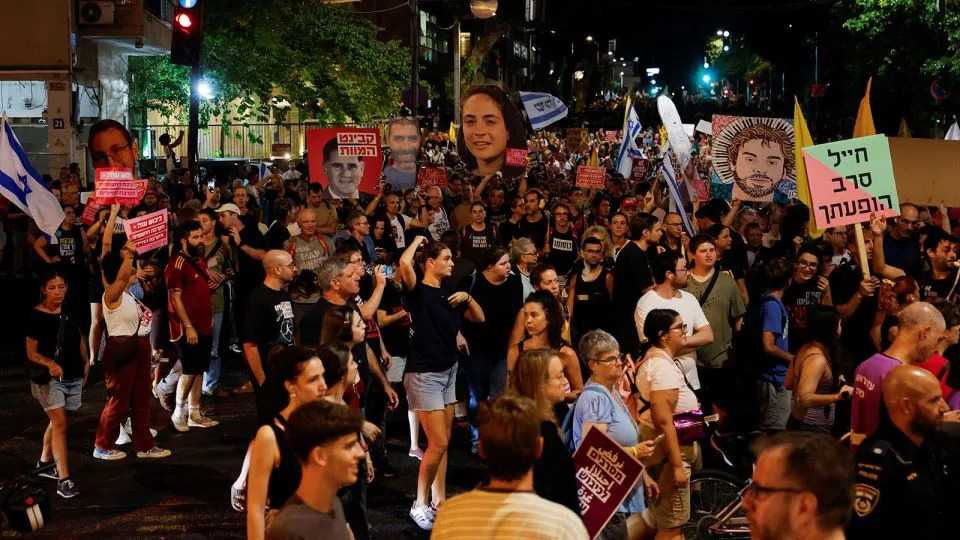 Demonstrators and relatives of hostages protest demanding the immediate release of the hostages and the end of the war, in Tel Aviv, Israel on Thursday. - Ammar Awad/Reuters