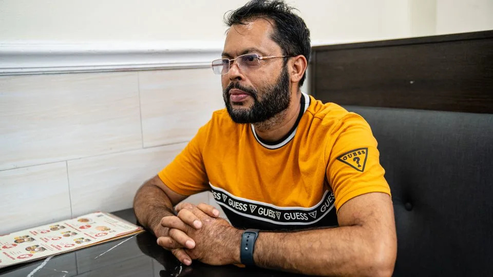Foysol Ahmed said Didarul Islam was a "very good officer" who served honestly. - Timothy Fadek for CNN
