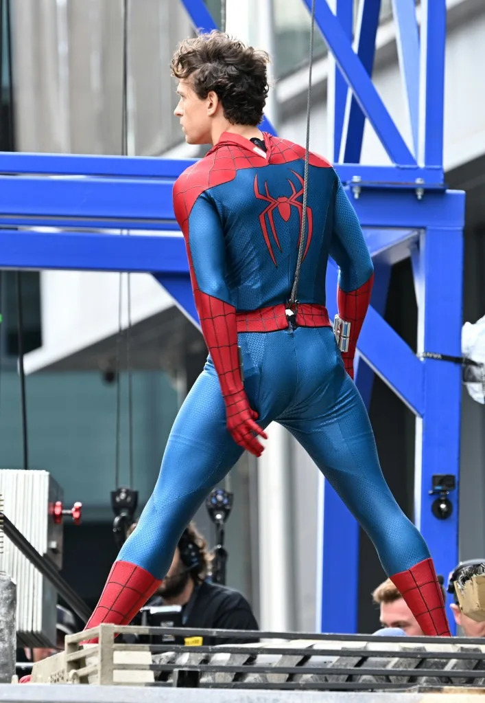 Tom Holland picks a wedgie while in his new Spider-Man costume for “Brand New Day.” UnBoxPHD / SplashNews.com