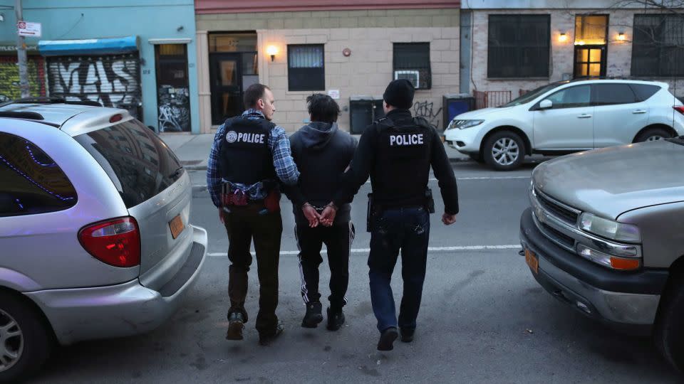 U.S. Immigration and Customs Enforcement (ICE), officers arrest an undocumented Mexican immigrant during a raid in the Bushwick neighborhood of Brooklyn on April 11, 2018 in New York City. - Photo by John Moore/Getty Images