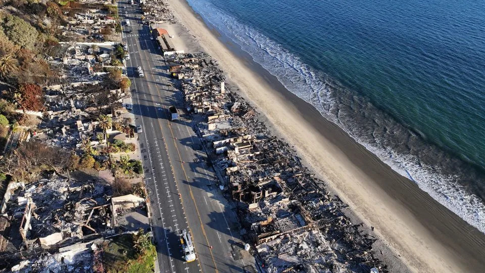 An aerial view of beachside homes destroyed in the Palisades Fire along the Pacific Coast Highway on January 16, in Malibu, California. - Mario Tama/Getty Images