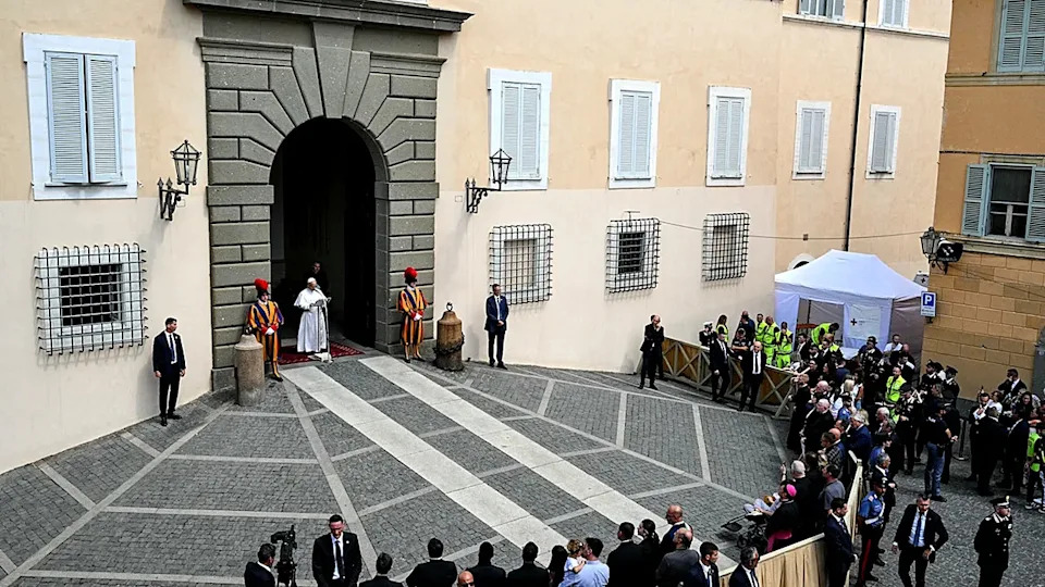 Pope Leo XIV speaks outside the Apostolic Palace