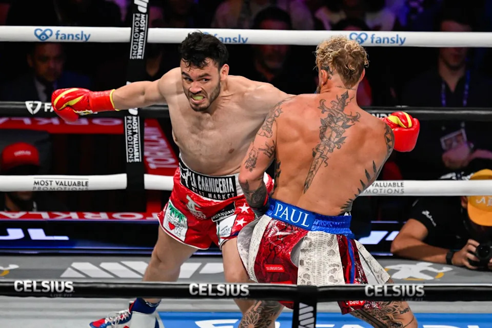 Jake Paul, right, and Julio César Chávez Jr., left, exchange punches during their cruiserweight bout in Anaheim on June 28.