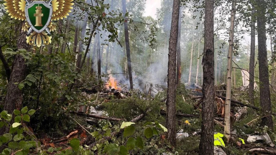 A view shows the debris of an Angara Airlines An-24 passenger aircraft at the crash site near Tynda in the Amur Region, Russia, July 24, 2025. - Far Eastern Transport Prosecutor/Handout/Reuters