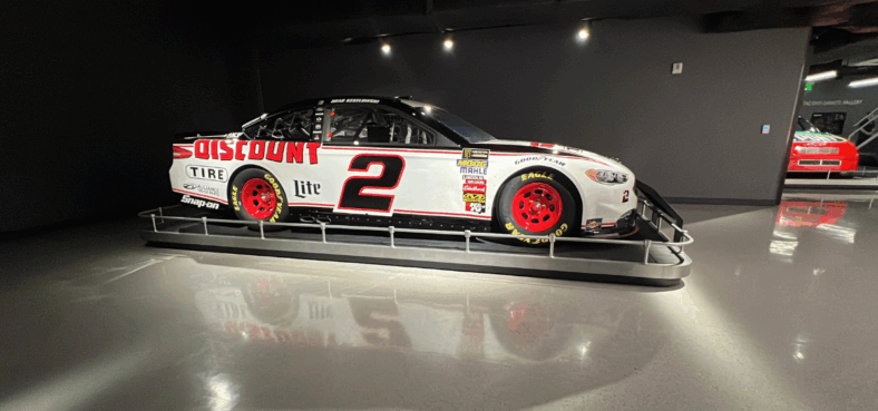 Seeing this NASCAR reminded me of our 2015 Ford Fusion Titanium—and how stock car safety innovations like crash data recorders moved from the track to our family sedans