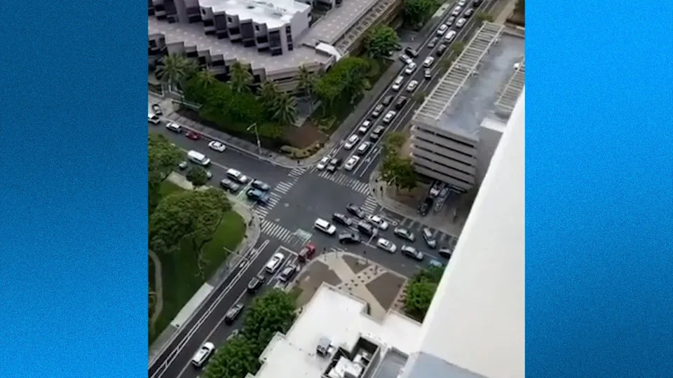 Cars jammed Honolulu streets as residents and visitors scrambled to escape the tsunami warning.