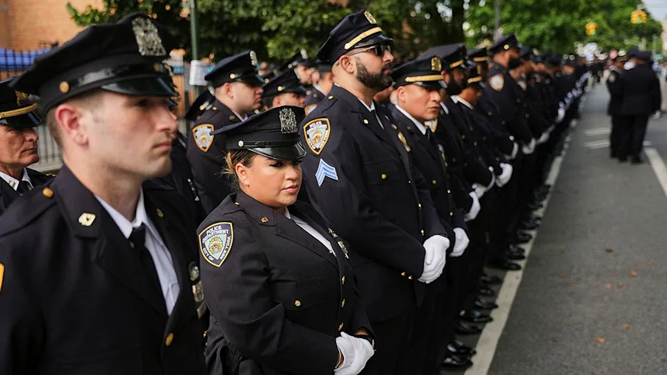 New York Police officers gather outside mosque