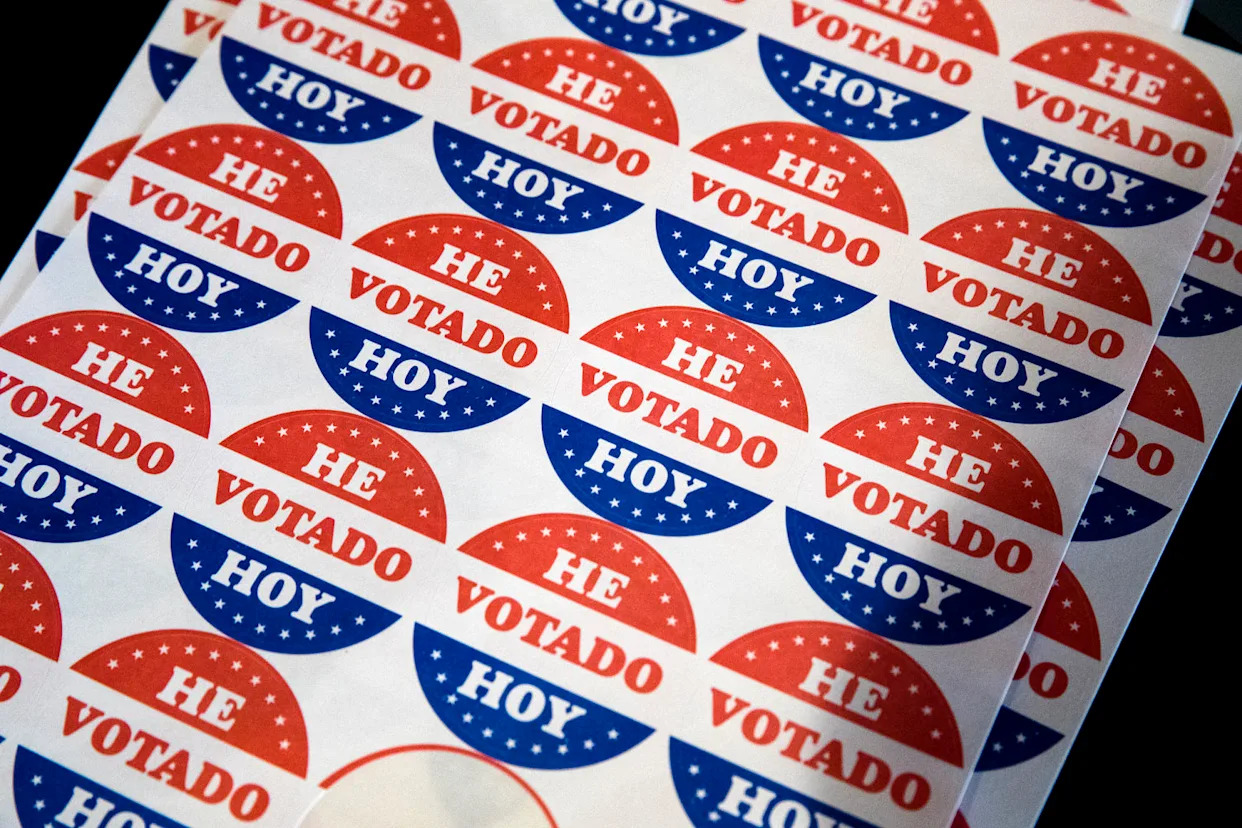 "He Votado Hoy" stickers at a polling place in Philadelphia in 2019. (Matt Rourke / AP file)