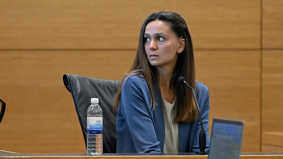 Ashlet Benefield took the stand at her trial for the murder of her estranged husband Doug Benefield. / Credit: Pool/Bradenton Herald