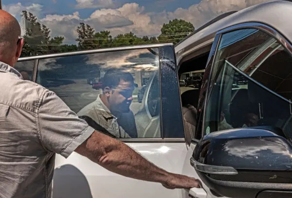 Kilmar Abrego Garcia get in a car after his release Friday from the Putnam County (Tennessee) Jail. (Photo by John Partipilo/Tennessee Lookout)
