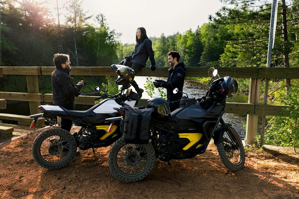 2025 can am origin with three riders on a trail