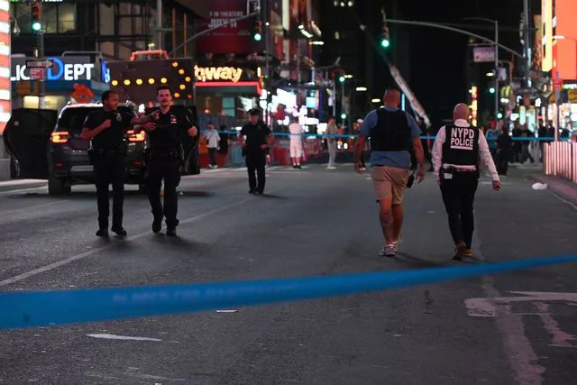 Kyle Mazza/NurPhoto via AP Three people were reportedly shot and injured in the Times Square shooting on Aug. 9