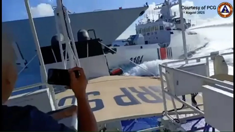 Chinese warship takes bow off own coast guard vessel in collision while chasing Philippine boats