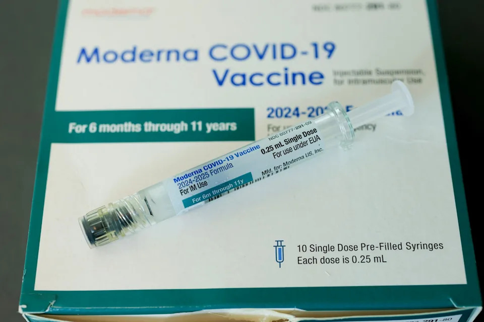 Joe Raedle/Getty Images - PHOTO: Moderna COVID-19 vaccine fills a syringe at Borinquen Health Care Center on May 29, 2025 in Miami, Florida.