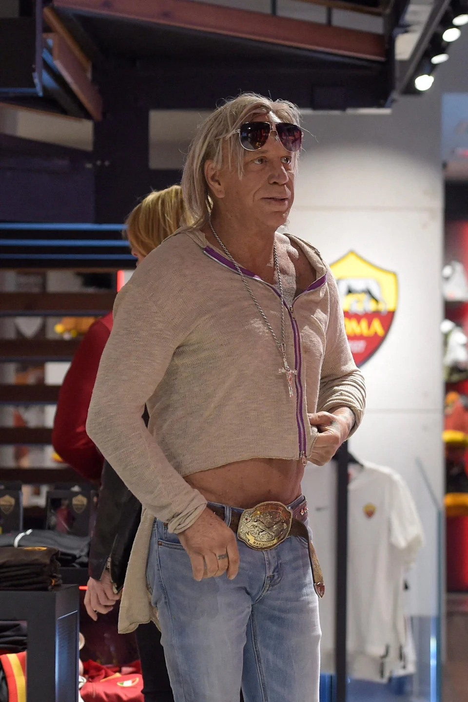 Mickey Rourke in Rome with a blond woman