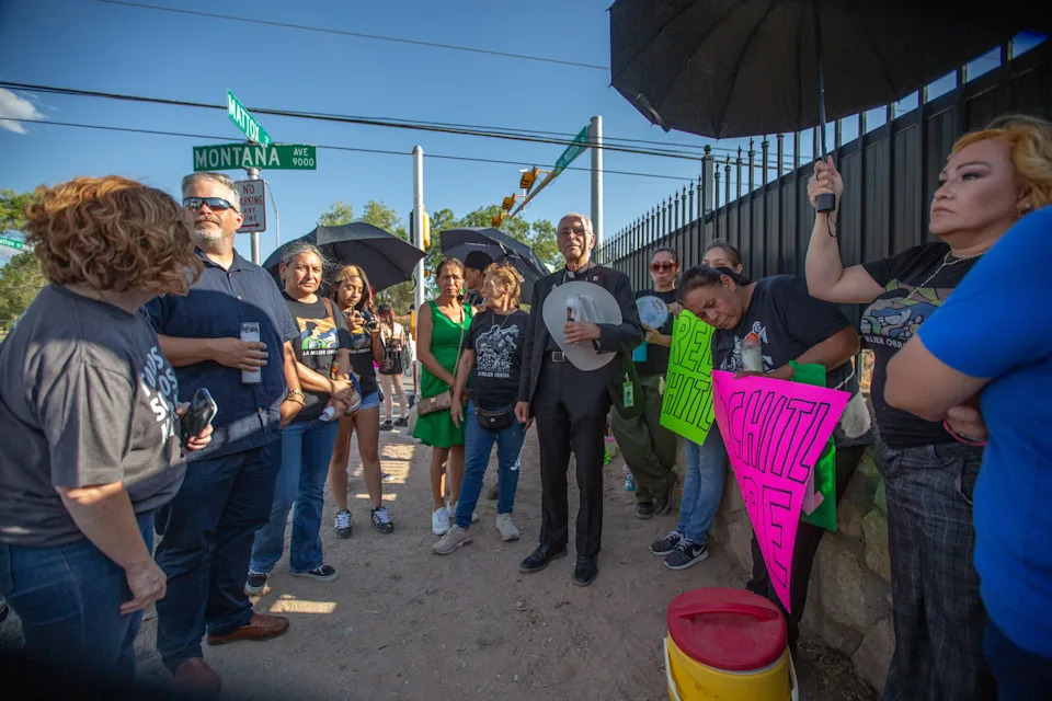 Bishop Mark Seitz gathers with the friends and colleagues of Catalina "Xóchitl" Santiago during a vigil calling for her release from ICE custody on Aug. 6, 2025