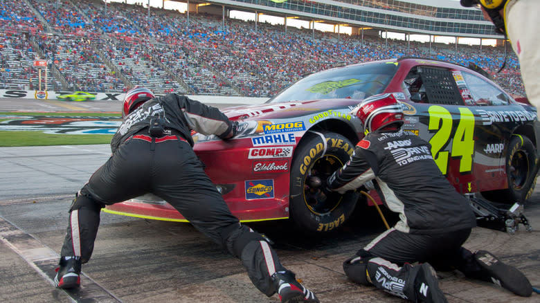 Jeff Gordon's car has a pit stop during the 2012 Texas 500