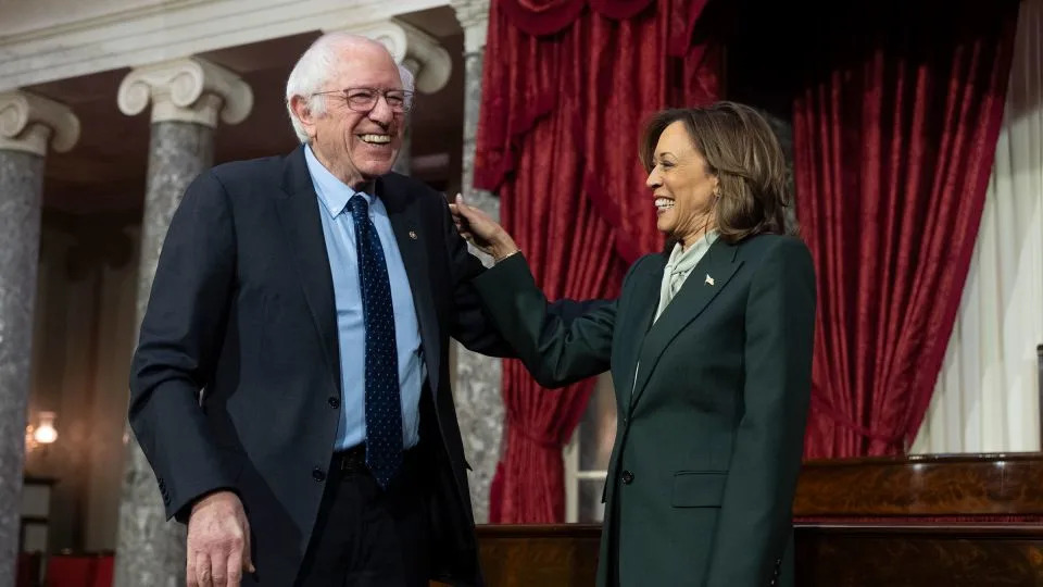Sen. Bernie Sanders talks to Vice President Kamala Harris during a ceremony in the Old Senate Chamber at the US Capitol, in January. - Manuel Balce Ceneta/AP