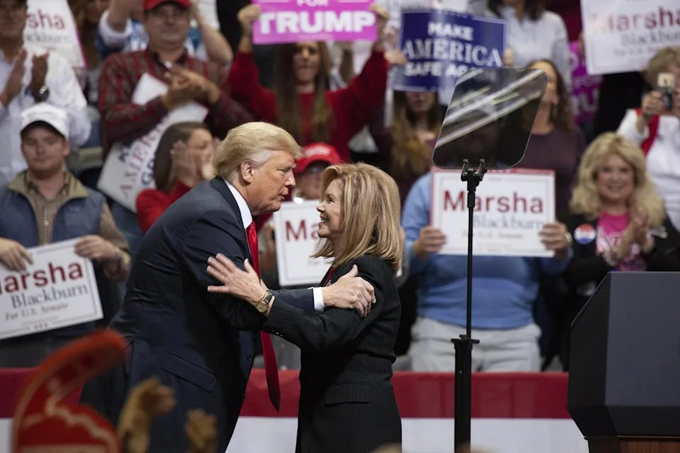 President Donald Trump appears with then-Senate candidate Marsha Blackburn at a MAGA rally in Chattanooga, Tennessee, in November 2018 (EPA)