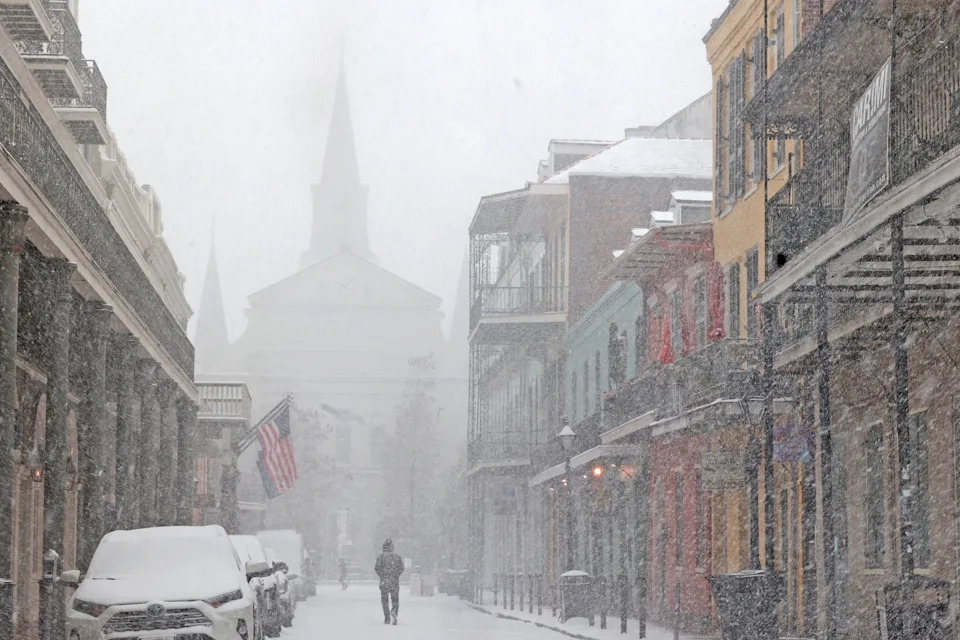 The iconic St. Louis Cathedral in the French Quarter is barely visible in the heavy snow on January 21, 2025 in New Orleans, Louisiana.