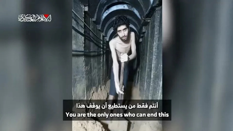 This screengrab from a video released on August 1, 2025 by the armed wing of Palestinian militant group Hamas, shows Israeli hostage Evyatar David in a tunnel. David, who turned 24 in captivity, was abducted during the Hamas attack on October 7, 2023. (Photo by Ezzedine al-Qassam Brigades / AFP)