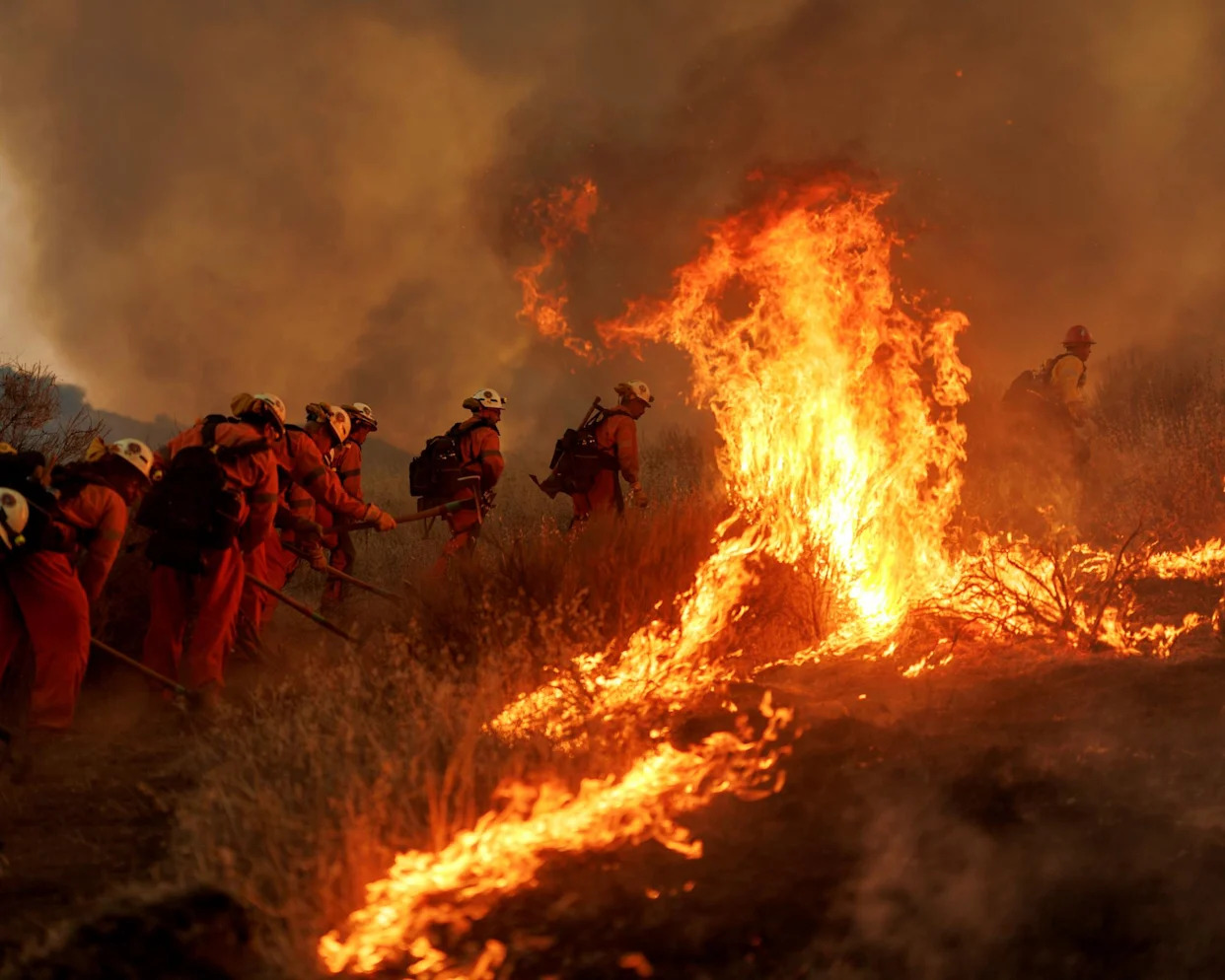 Rapidly spreading brush fire prompts evacuations for thousands in California