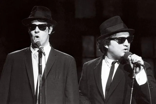 NBCU Photo Bank/NBCUniversal via Getty Dan Aykroyd and John Belushi as the Blues Brothers on 'Saturday Night Live' on Nov. 18, 1978.
