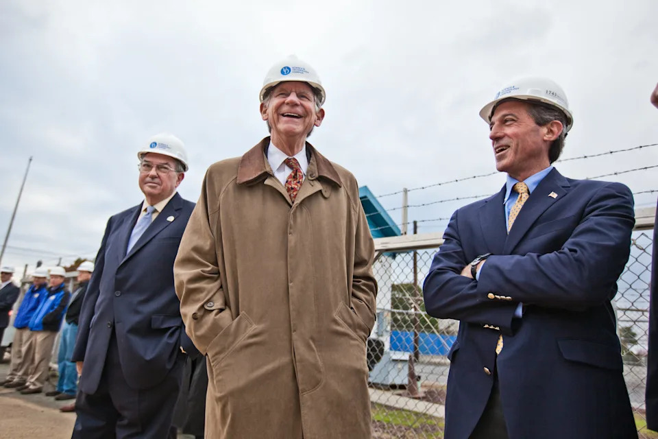 From left, Newark Mayor Vance Funk, Congressman Mike Castle and Congressman-elect John Carney gather to watch the demolition of the Chrysler plant Nov. 5, 2010.