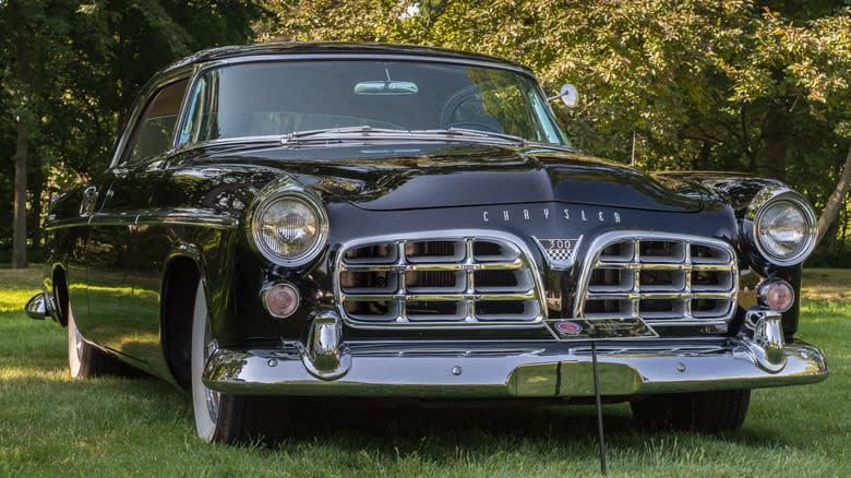 Chrysler 300 parked in a grass lawn