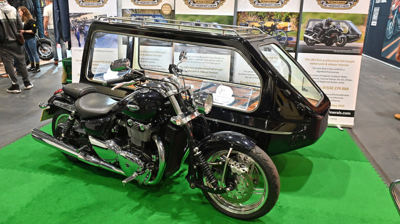 A motorcycle and sidecar funeral hearse is displayed during the Devitt Insurance MCN London Motorcycle Show at ExCel on February 16, 2024 in London, England.