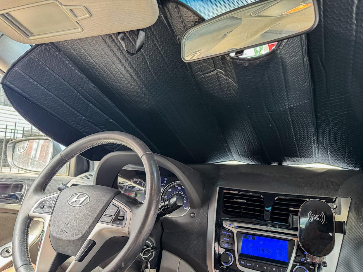 Keep Your Car’s Interior and Electronics from Cooking on Hot Days with a Sun Shade