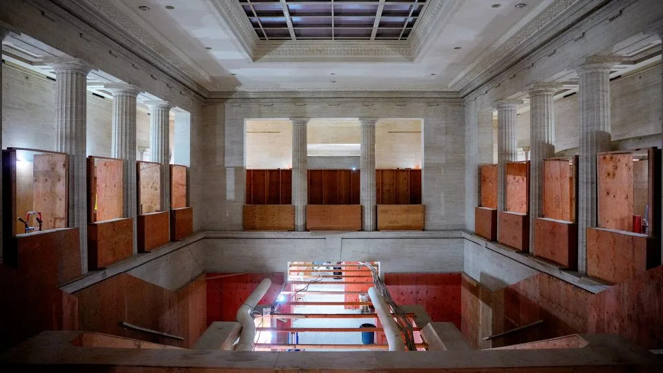 The grand atrium is visible as a massive renovation continues of the Marriner S. Eccles Federal Reserve Board Building and the 1951 Constitution Avenue Building on July 24. - Andrew Harnik/Pool/AFP/Getty Images