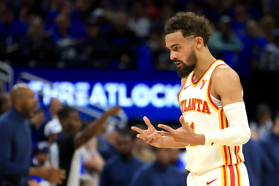ORLANDO, FLORIDA - APRIL 15: Trae Young #11 of the Atlanta Hawks gestures during the second half of an NBA play-in tournament game against the Orlando Magic at Kia Center on April 15, 2025 in Orlando, Florida. NOTE TO USER: User expressly acknowledges and agrees that, by downloading and or using this photograph, User is consenting to the terms and conditions of the Getty Images License Agreement. (Photo by Mike Ehrmann/Getty Images)